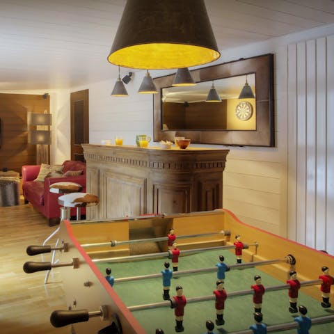 Get competitive with a game of foosball or ping pong
