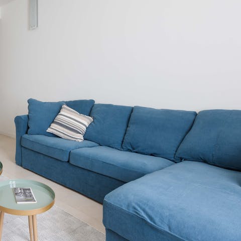 Sink into the comfortable sofa after a day exploring