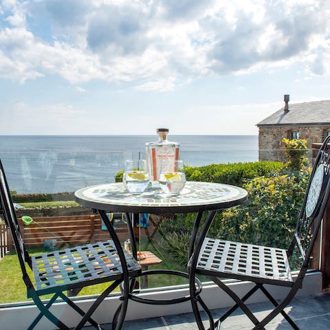 Sip a Cornish craft gin and tonic in the sunshine outside on the patio