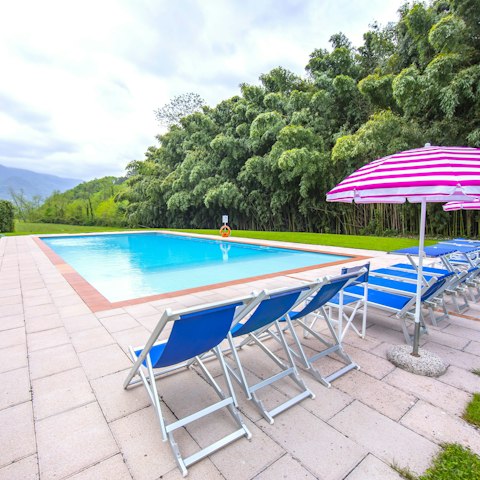 Admire the vistas of the Tuscan countryside from the private pool