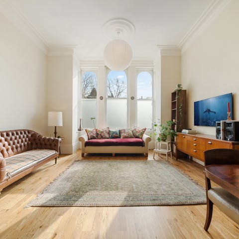 Relax in the comfortable living area after a busy day exploring the capital