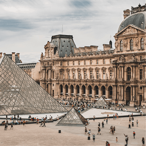 Discover the wealth of treasures housed in the iconic Louvre Museum – a leisurely twenty-minute stroll from your apartment