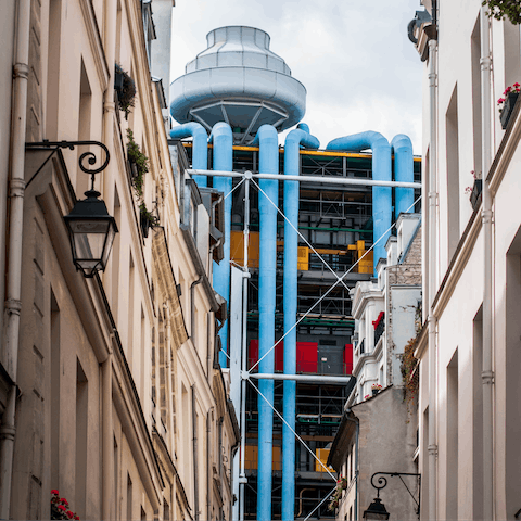 Visit the architectural and cultural marvel that is the Centre Pompidou – this monumental building is just a couple of minutes away