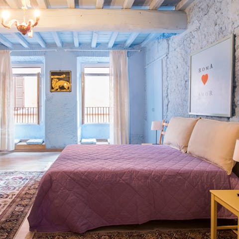 Wake up and take in views of the historic Via del Governo Vecchio from the pair of cubby windows