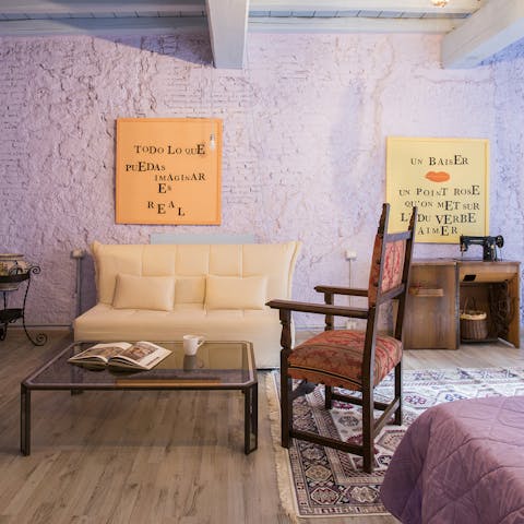 Relax on the sofa beneath the beams while enjoying your morning coffee