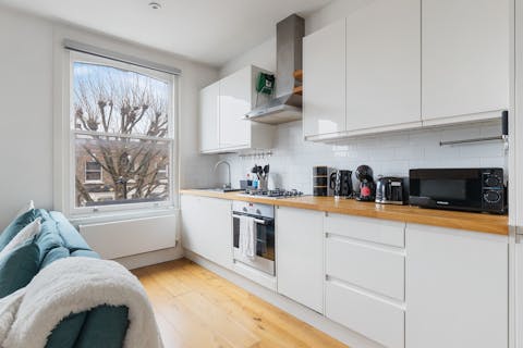Rustle up a full English breakfast in the sleek kitchen