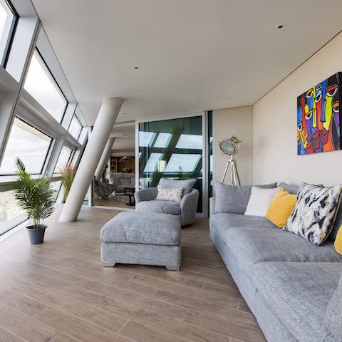 Choose to take in the views between two stylish sitting rooms