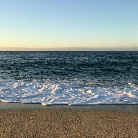 Walk the 15 minutes to Cala Blanca beach