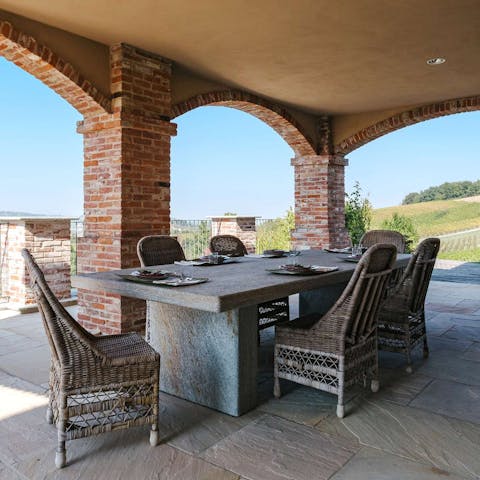 Enjoy beautiful vineyard views as you dine alfresco