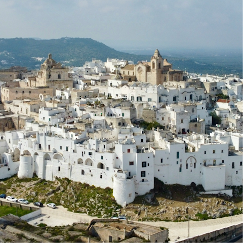 Drive into Ostuni for restaurants and its whitewashed streets