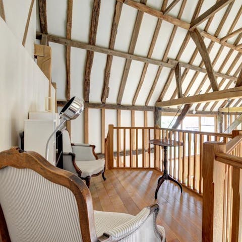 Relax with a good book and a glass of wine on the mezzanine's reading nook