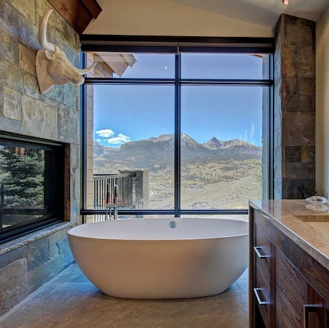 Soak in the large free-standing bathtub