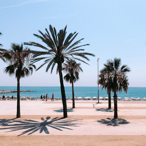 Stay right on the sandy shores of Barceloneta Beach