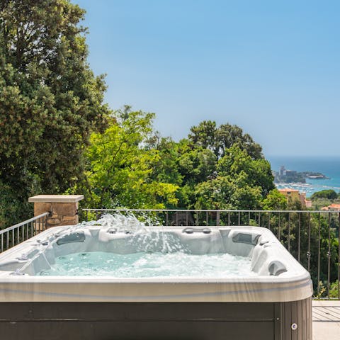 Relax in the private hot tub or enjoy an afternoon splashing in the pool