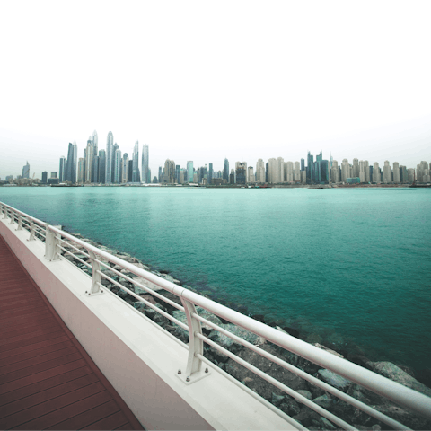 Look back over the city skyline from this exclusive Palm Jumeirah address