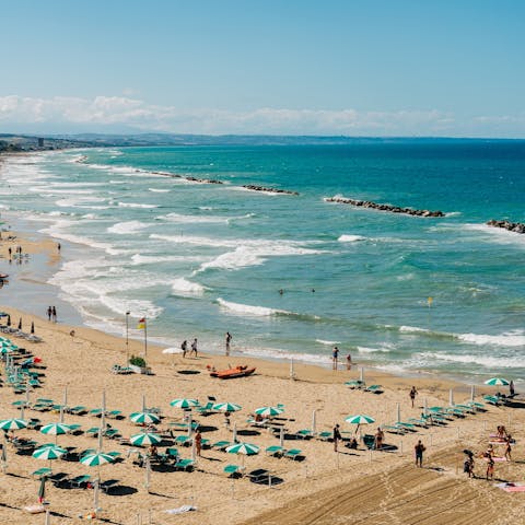 Stroll to Portoverde Beach, 15 minutes away