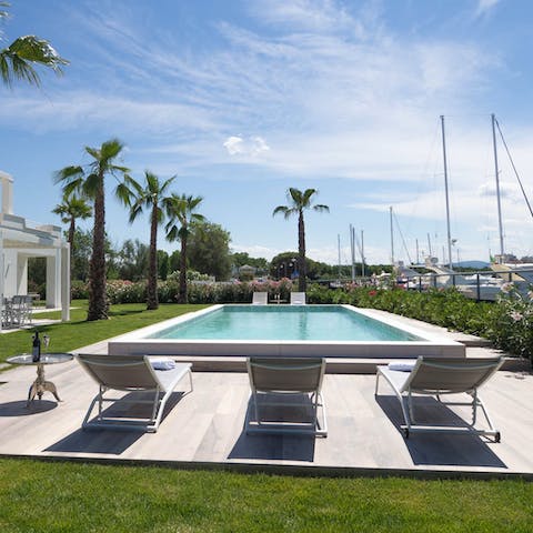 Laze in the sun after a dip in the pool