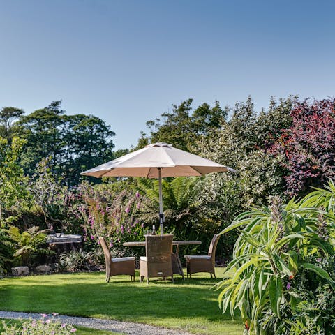 Enjoy a spot of cream tea in the garden on a sunny day