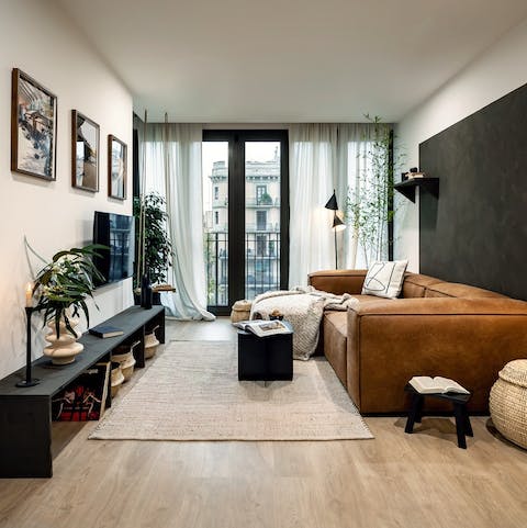 Kick back in the light-filled living room with a glass of Spanish wine after a day of sightseeing