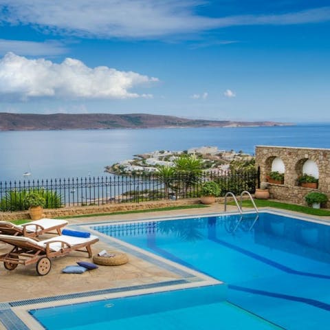 Paddle about in the villa's swimming pool overlooking the Aegean Sea