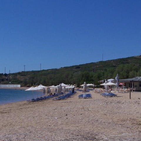 Pack a picnic and stroll over to Paralia Limani Passa in ten minutes