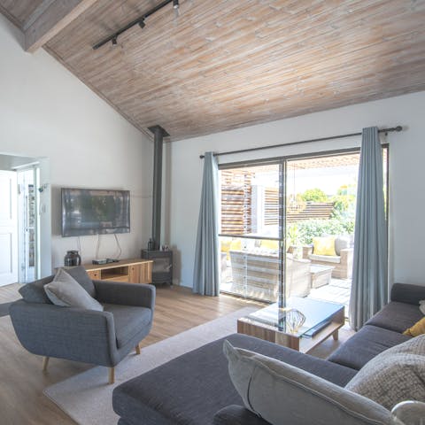 Get cosy in front of the wood-burning stove on chilly nights