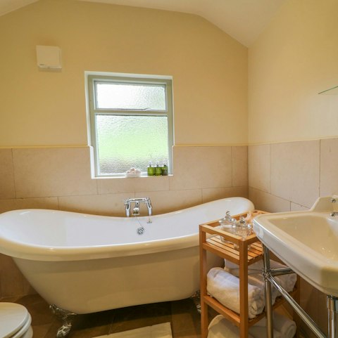 Soak in the roll top bath, the ultimate way to unwind