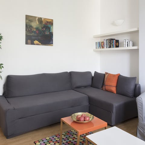 Grab a book off the shelf and stretch out on the sofa