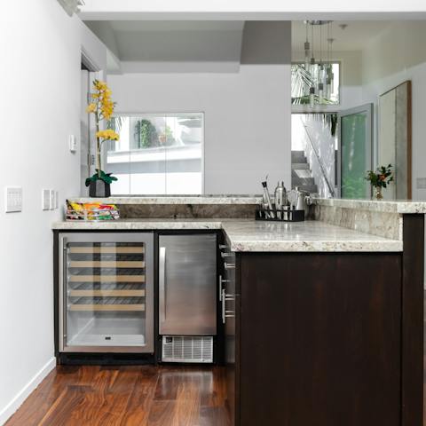 Rustle up a round of cocktails at the wet bar