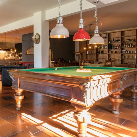 Challenge a friend to a game of snooker