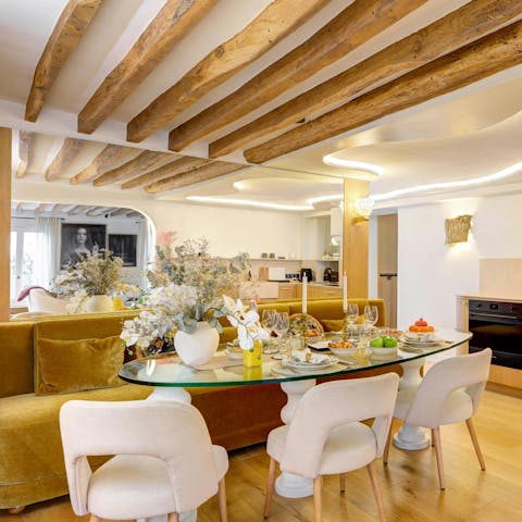 Take in the delicate contrast between modern decor and original ceiling beams