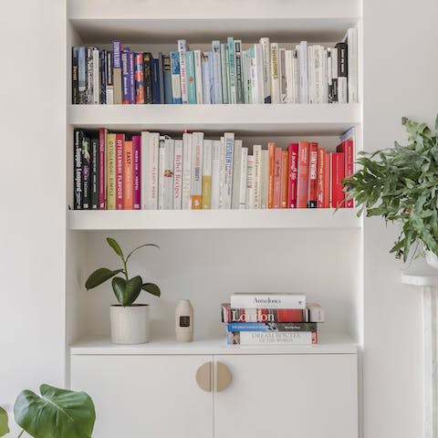 Lose yourself in a paperback from the well-stocked bookshelf