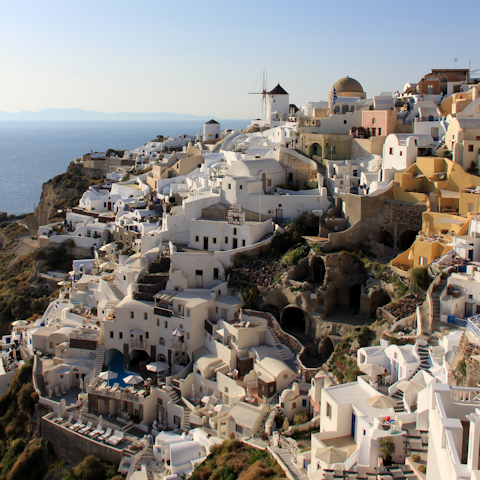 Stroll around the picturesque streets of Oia, just a short distance away