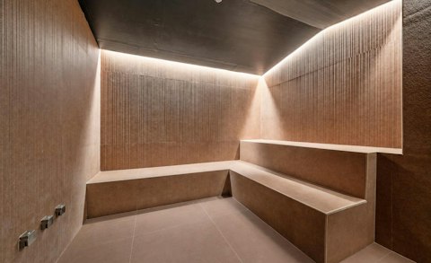 Sweat it out in the warmth of the shared steam room