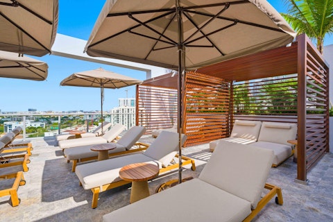 Stretch out on the shared sun deck above the Miami skyline