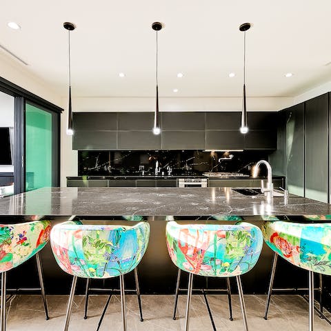 Wake up with an americano at the stylish breakfast bar