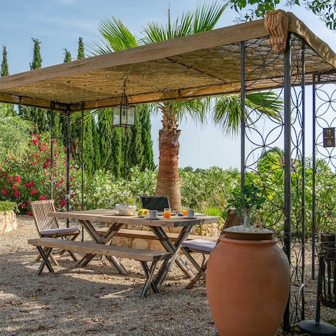 Spend balmy mornings drinking fresh orange juice in the garden