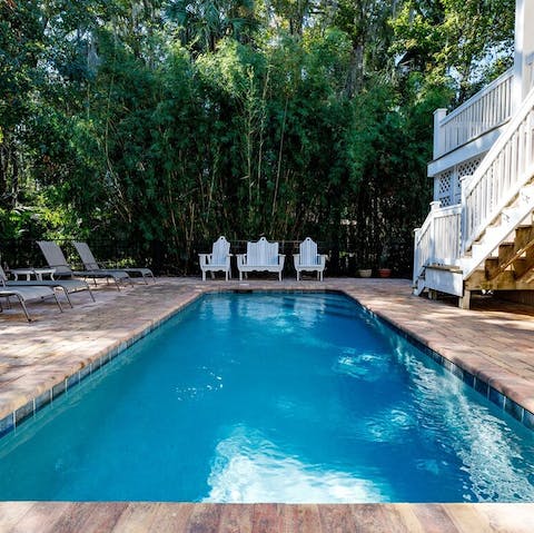 Cool down in the pool tucked amidst the island's fauna