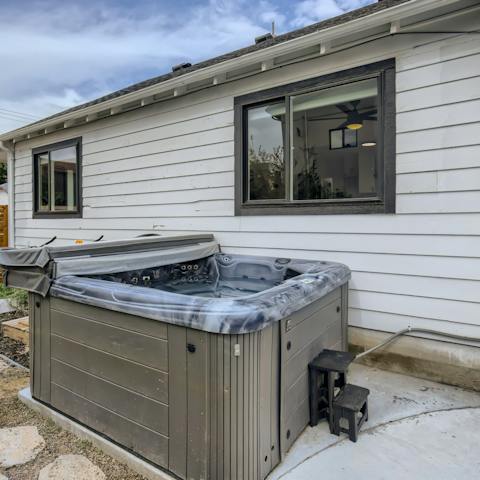 Experience total relaxation from the outdoor hot tub