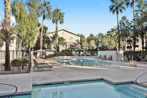 Cool off in the shared pool under Arizona's blue skies