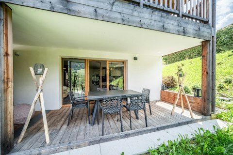 Dine alfresco on the deck and admire views of the Alpine slopes