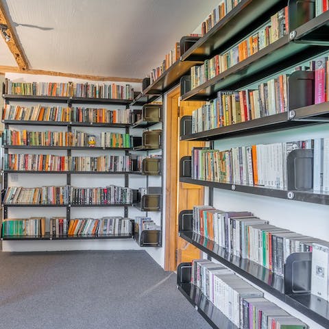 Browse through the host's library and movie collection for a cosy night in