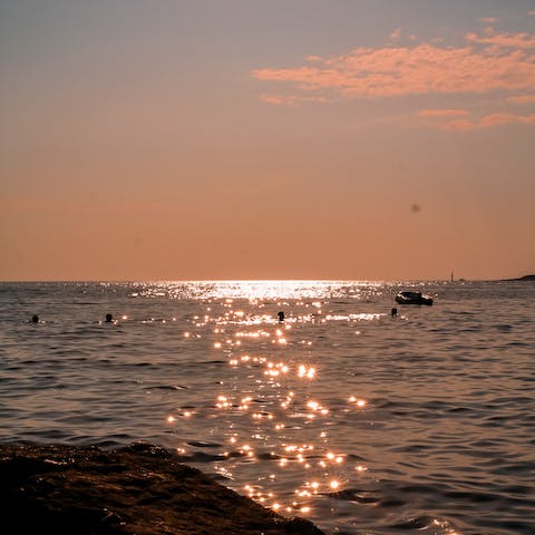 Make your way to the sea at Poreč, a fifteen-minute drive away