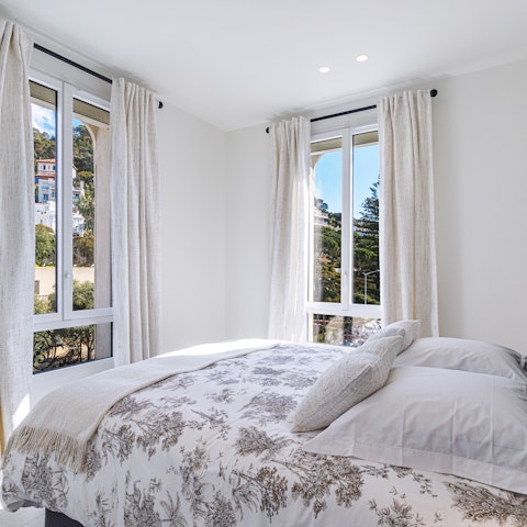 Wake up feeling restored in the serene bedroom