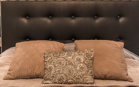The soothing earthy tones of the bedrooms