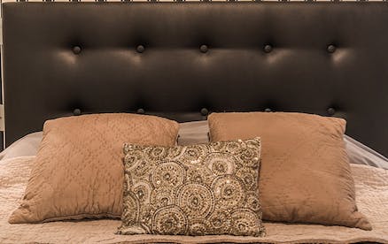 The soothing earthy tones of the bedrooms