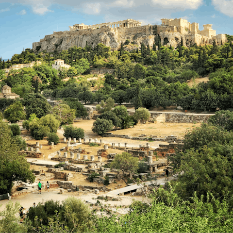 Explore the ancient ruins of the Acropolis, a four-minute walk away