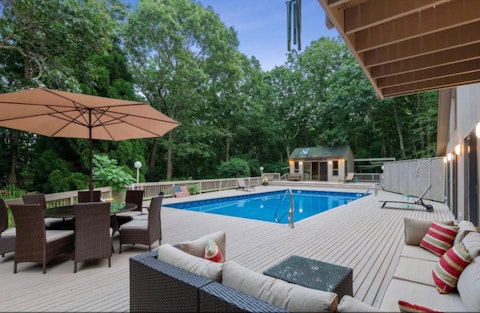 Swim laps then dry off beneath a canopy of trees