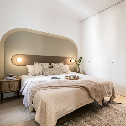 Enjoy a blissful night's sleep in the stylish bedroom