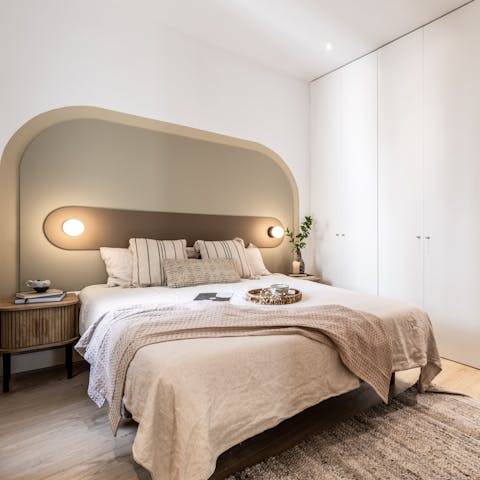 Enjoy a blissful night's sleep in the stylish bedroom